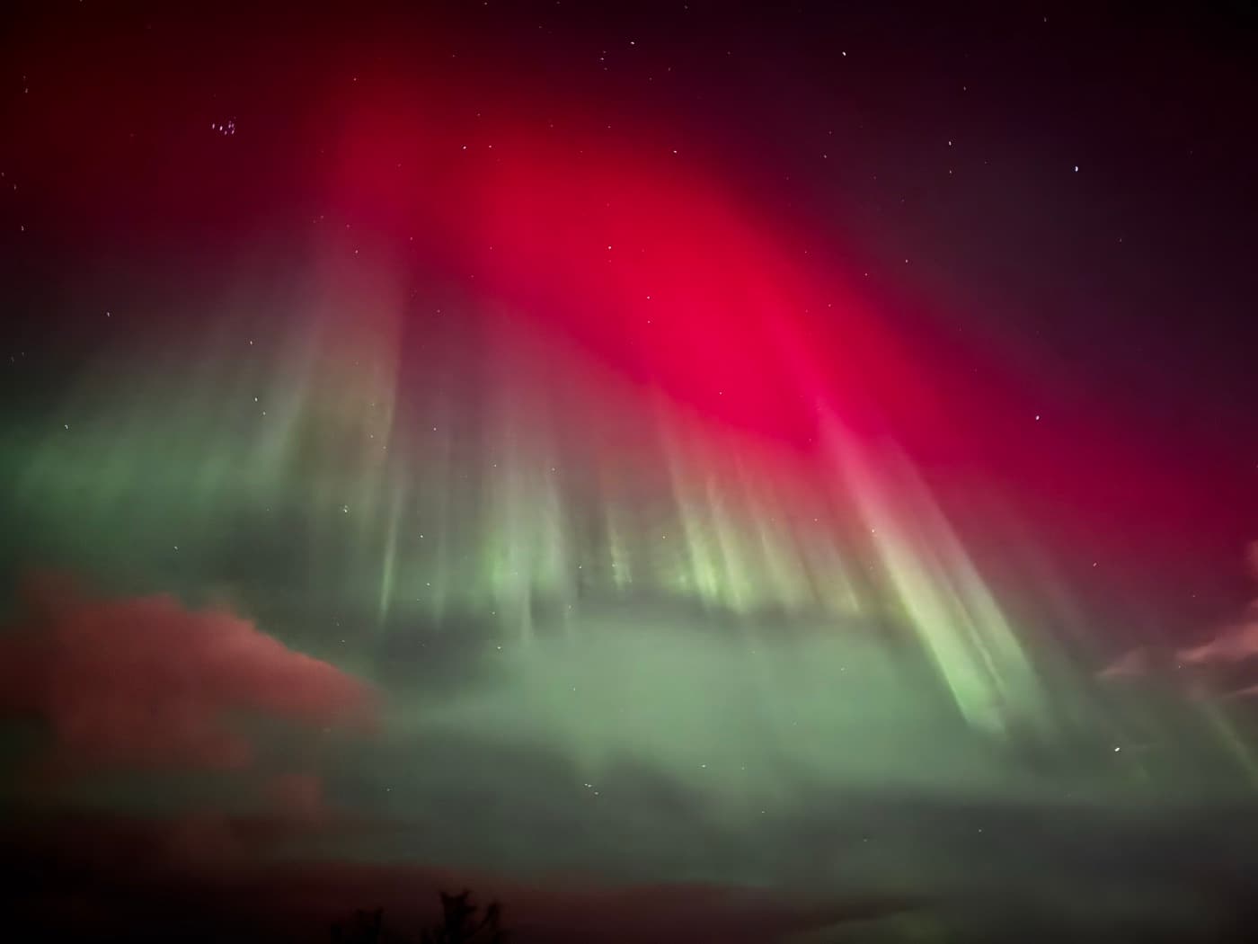 Red and green aurora borealis over Iceland